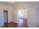 An adjacent bedroom features closet and view of desert landscape at 1463 W Mead Dr, Chandler, AZ 85248