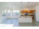 Open kitchen layout with tile floors and stainless steel appliances at 1463 W Mead Dr, Chandler, AZ 85248