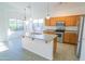 Open kitchen with ample counter space, stainless steel appliances and tile flooring at 1463 W Mead Dr, Chandler, AZ 85248