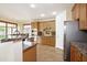 Bright, spacious kitchen with granite countertops and stainless steel appliances at 14823 W Windsor Ave, Goodyear, AZ 85395