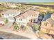 Aerial view of a two-story home featuring a tile roof, desert landscaping, a private backyard, and a spacious layout at 17009 S Coleman St, Phoenix, AZ 85045