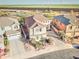 Aerial view of a two-story home with a tile roof, desert landscaping, and a private backyard at 17009 S Coleman St, Phoenix, AZ 85045