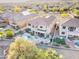 Stunning aerial view showcasing a backyard pool and lush landscaping in a beautiful residential neighborhood at 17009 S Coleman St, Phoenix, AZ 85045