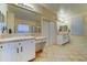 Large primary bathroom featuring dual sink vanity and a separate shower and toilet at 17009 S Coleman St, Phoenix, AZ 85045