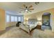 Large bedroom with bay windows, ceiling fan and a bedroom suite at 17009 S Coleman St, Phoenix, AZ 85045