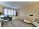 Comfortable bedroom with a large window providing natural light, and neutral paint at 17009 S Coleman St, Phoenix, AZ 85045