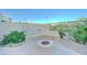 Backyard fire pit and seating area provide an inviting space for outdoor enjoyment at 17009 S Coleman St, Phoenix, AZ 85045