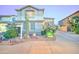 Charming two-story home with a well-maintained landscape, desert plants and a cozy front yard in a desirable neighborhood at 17009 S Coleman St, Phoenix, AZ 85045