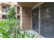Charming patio features verdant plantings with a sliding glass door entry at 1701 E Colter St # 151, Phoenix, AZ 85016