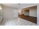 Bright foyer with tile and hardwood floors offers a welcoming entrance to the home at 17238 N 107Th Ave, Sun City, AZ 85373