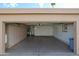 Open garage with storage cabinets and access to the house at 17238 N 107Th Ave, Sun City, AZ 85373