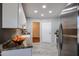 Updated kitchen with stainless steel appliances, granite countertops and white cabinetry at 17238 N 107Th Ave, Sun City, AZ 85373