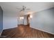 Open living room with recessed lighting and hardwood floors at 17238 N 107Th Ave, Sun City, AZ 85373