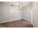 Bright living room with wood-look flooring, neutral walls and recessed lighting at 17238 N 107Th Ave, Sun City, AZ 85373
