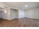 Large living room with modern flooring and neutral paint is ready for new owners at 17238 N 107Th Ave, Sun City, AZ 85373