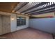 Outdoor patio area complete with a pergola-style roof, and a brick-tiled floor at 17238 N 107Th Ave, Sun City, AZ 85373