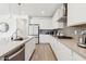 Well-equipped kitchen with stainless steel appliances, ample counter space, and stylish backsplash at 22499 E Mewes Rd, Queen Creek, AZ 85142
