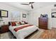 Inviting bedroom featuring a ceiling fan, bright light and a relaxing atmosphere at 2908 E Pinchot Ave, Phoenix, AZ 85016