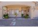 Cozy front porch adorned with potted plants, offering a welcoming entrance to this charming home at 2911 W Keim Dr, Phoenix, AZ 85017