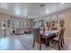 Spacious living and dining area showcasing a cozy sectional sofa and a stylish dining set at 2911 W Keim Dr, Phoenix, AZ 85017