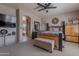 Comfortable bedroom featuring an ensuite bathroom and stylish furnishings at 2911 W Keim Dr, Phoenix, AZ 85017