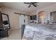 Main bedroom featuring a sliding barn door, large bed, and modern decor at 2911 W Keim Dr, Phoenix, AZ 85017