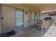 Covered patio with table, chairs, and grill, perfect for outdoor entertaining at 2911 W Keim Dr, Phoenix, AZ 85017
