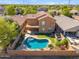 Aerial view of a home featuring a private backyard pool and landscaped grounds at 2930 E Quiet Hollow Ln, Phoenix, AZ 85024