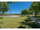A view of the community basketball court, walking path, and green spaces, designed for community enjoyment at 2930 E Quiet Hollow Ln, Phoenix, AZ 85024
