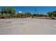 Community basketball court with sun shelter, picnic table and lighting for evening play at 2930 E Quiet Hollow Ln, Phoenix, AZ 85024