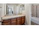 Spacious bathroom with a tile floor and luxurious granite countertops at 2930 E Quiet Hollow Ln, Phoenix, AZ 85024