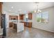 Open kitchen with granite countertops and stainless steel appliances at 2930 E Quiet Hollow Ln, Phoenix, AZ 85024
