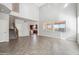 Open-concept living room with tile flooring and plenty of natural light at 2930 E Quiet Hollow Ln, Phoenix, AZ 85024