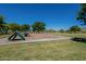 Community playground area equipped with climbing structure, dome, and spinner at 2930 E Quiet Hollow Ln, Phoenix, AZ 85024