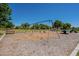 Community playground area equipped with swings, benches, and wood chip safety surfacing at 2930 E Quiet Hollow Ln, Phoenix, AZ 85024