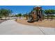 Community playground features a covered play structure, slide, and basketball court for recreation and Gathering fun at 2930 E Quiet Hollow Ln, Phoenix, AZ 85024
