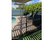 Outdoor patio with grill, seating, and the corner of a sparkling pool at 30440 N 42Nd Pl, Cave Creek, AZ 85331