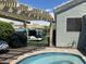 Inviting backyard featuring a pool, cozy seating area, pergola and lush turf at 30440 N 42Nd Pl, Cave Creek, AZ 85331