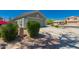 A single story home featuring desert landscaping and a two car garage at 30440 N 42Nd Pl, Cave Creek, AZ 85331