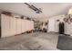 Spacious garage with ample storage cabinets and tool organization at 30440 N 42Nd Pl, Cave Creek, AZ 85331