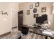 Office with a door and wood-like flooring at 30440 N 42Nd Pl, Cave Creek, AZ 85331