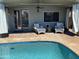 Backyard pool area includes a covered patio, outdoor seating and is perfect for relaxation and outdoor enjoyment at 30440 N 42Nd Pl, Cave Creek, AZ 85331