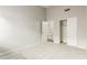 Bright bedroom offering plush carpet flooring and access to a bathroom and closet at 3152 N 83Rd Pl, Scottsdale, AZ 85251
