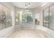 Bright dining nook with large windows offering plenty of natural light and neutral tile flooring at 3152 N 83Rd Pl, Scottsdale, AZ 85251