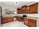 Updated kitchen with granite countertops, stainless steel appliances, and ample cabinet space at 3152 N 83Rd Pl, Scottsdale, AZ 85251