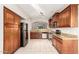 Well-appointed kitchen featuring granite countertops, stainless steel appliances, and custom cabinetry at 3152 N 83Rd Pl, Scottsdale, AZ 85251