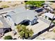A birds eye view of the backyard and surrounding neighborhood, highlighting a fenced perimeter at 32101 W Palo Verde St, Wittmann, AZ 85361