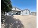 The backyard features desert landscaping, offering low maintenance and water conservation benefits at 32101 W Palo Verde St, Wittmann, AZ 85361