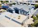 Beautiful one-story home with gray accent trim and an attractive landscaped front yard, featuring an attached garage at 32101 W Palo Verde St, Wittmann, AZ 85361