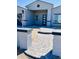 Inviting front entrance with a landscaped walkway and modern front door at 32101 W Palo Verde St, Wittmann, AZ 85361
